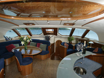 BEST REVENGE 5 Yacht Charter - Salon Bar, Dining Table, Seating Areas