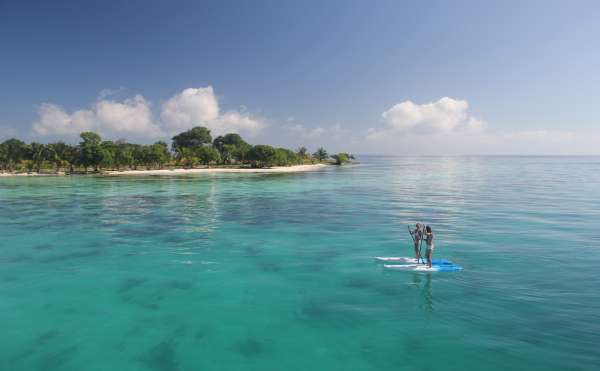 Paddleboarding at Moho Caye