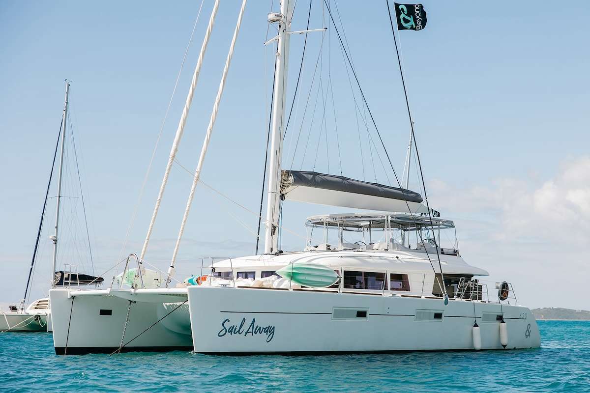 Sail Away is a 2014 Lagoon 620 in pristine condition having just undergone additional refurbishment and upgrades. She is one of the few charter catamarans that can take 10 guests in 5 double cabins with queen beds and en suite bathrooms with separate showers. She is beautifully equipped with luxurious furnishings and extensive electronics and is the ideal boat for families or groups that want a luxurious, comfortable and fast catamaran.
With respect to water sports, her tenderlift is an ideal sunbathing platform while its 17