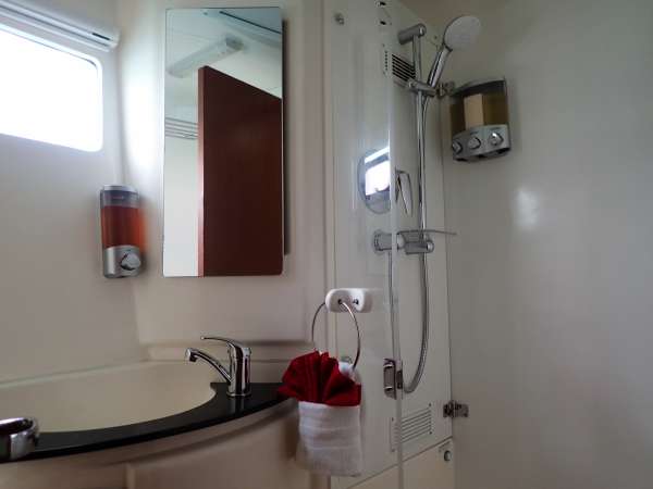 Each cabin has private head with separate shower stall