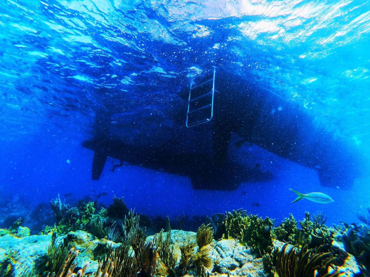 Under the waters blue boat shot