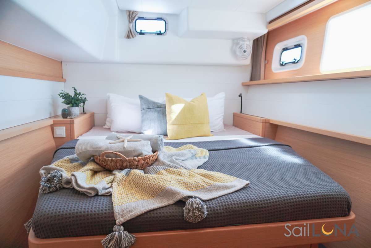Settle into your plush queen-size bed for a restorative night’s sleep at sea. 