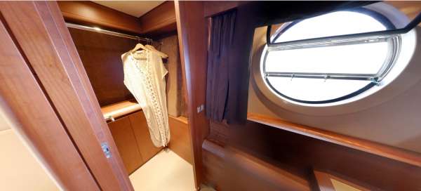 Master cabin has 2 large circular windows