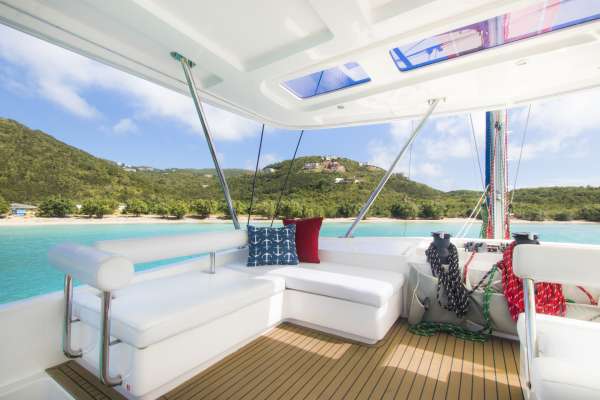 The flybridge has ample seating and provides a shaded, breezy area for happy hour.