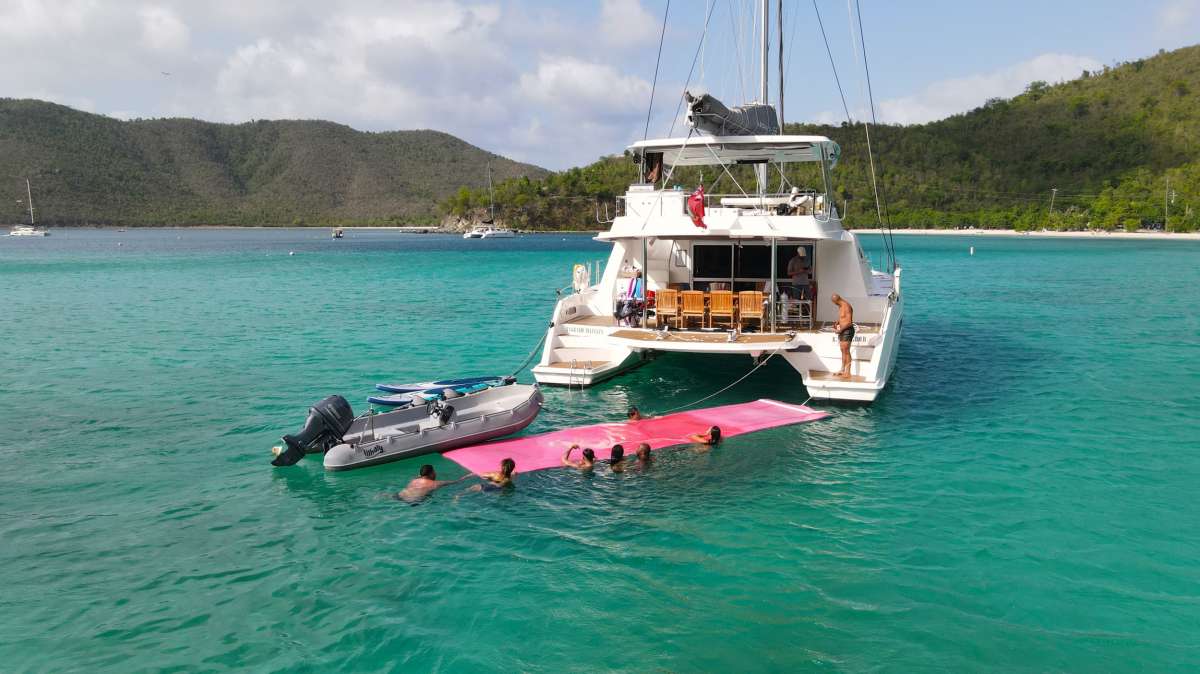 Enjoying the floating mat off the stern