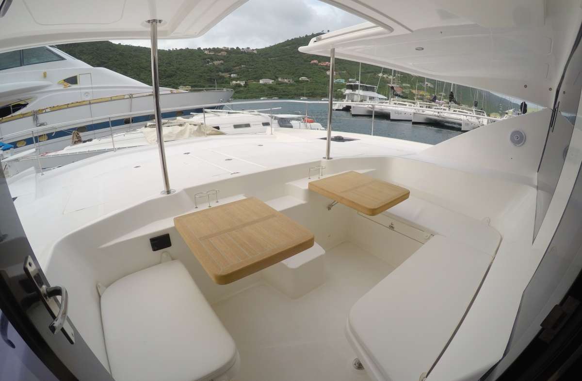 New teak tables in the forward cockpit