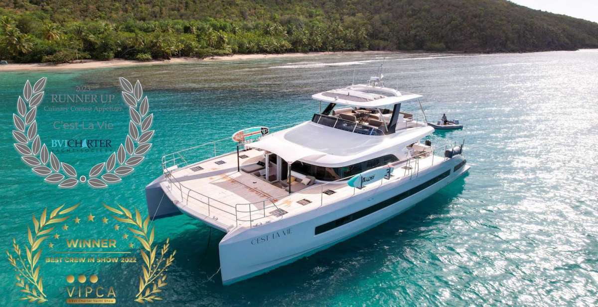C’est La Vie was designed to create unforgettable vacation experiences exploring a range of activity and relaxation, mixed with high end luxury and unrivaled adventure, all amidst a tropical backdrop. A well-appointed 2022 Lagoon Sixty7, C’est La Vie offers bespoke luxury in 2 spacious Queen cabins and a massive master cabin, each with en-suite washrooms and plenty of living space. Topside you will find multiple sun beds, loungers and wet bars aplenty.
Her crew of 3 leaves no need unmet; offering decades of combined professional experience to create a seamless, customized and highly interactive encounter. No finer culinary experience can be found ashore or afloat, as chef Dani provides a rich understanding of all things epicurean while undertaking the constant search for the finest and freshest ingredients. Captain Paul will keep you feeling at ease, with his unassuming, patient approach and his dry wit. He is an avid waterman, excelling in scuba, fishing and engaging in a keen interest for Nautical lore. First mate Danika knows all of the best snorkels and hikes, and at the end of a long day (or morning hike) will shake up a cocktail that would make Hemingway swoon.
C’est La Vie’s offerings are second to none, including electric foiling surfboards, sea bobs, scuba compressor and gear, floating docks and a massive tender to get you to the finest beaches. Interested in becoming dive certified? Captain Paul is a PADI dive instructor and can indulge guests of all abilities in exploring the underwater world. Sit in the lap of luxury via a professionally designed and decorated interior. In addition to outdoor activities, the yacht boasts a powerful hi-fi system, lots of games and movies.