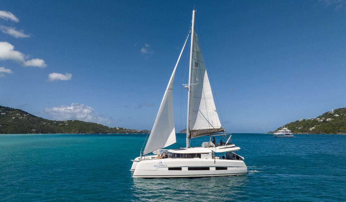 Aquanimity is your perfect charter option - a new model and stylish design. The yacht is equipped with four queen sized cabins, all with en-suite facilities and AC.
This new model of Catamaran has an abundance of interior and exterior space with multiple sunbathing decks and an open plan layout. Aquanimity is ideal for relaxing with privacy and socialising on board.