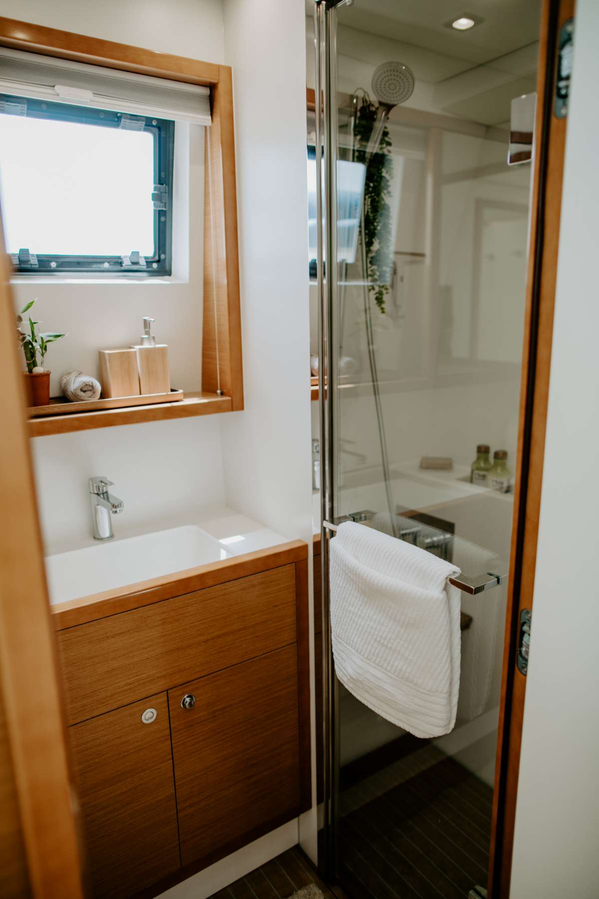 Port Aft vanity and stall shower