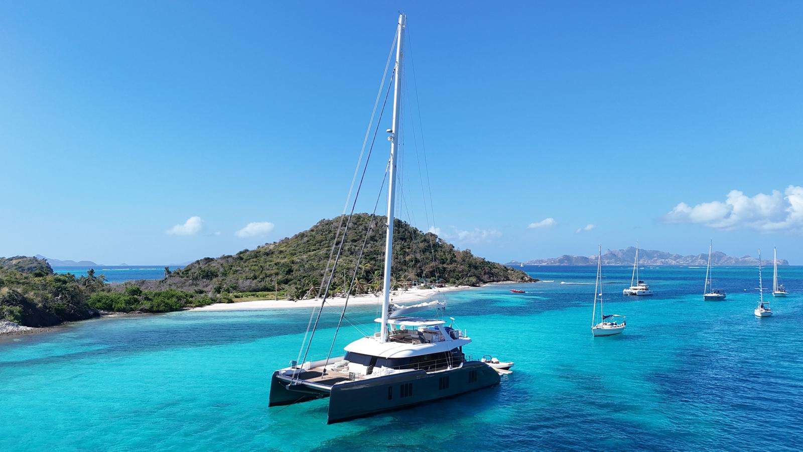 Sunreef 70’+ “S/Y YOLO”
Experience pure freedom aboard YOLO, the stunning new Sunreef 70’+. A masterpiece of elegance and innovation, this luxury catamaran blends performance and comfort to perfection.
Built for those who believe life should be lived to the fullest, this exceptional catamaran turns every voyage into a collection of unforgettable moments.
With her sleek, modern lines and commanding presence, YOLO stands out in any bay or harbor. Her spacious decks invite you to bask in the sun, unwind in comfort, or enjoy alfresco dining surrounded by the endless blue of the sea.
Step aboard and discover an world that exudes sophistication and warmth. The interior is flooded with natural light through large windows and skylights, creating a warm and airy atmosphere.
The main salon is an open, elegant space that flows seamlessly into the dining area and fully equipped galley, forming the social heart of the yacht.
Every detail — from the refined finishes to the soft textures — has been designed for comfort and pleasure.
YOLO offers multiple spaces to relax and connect:
• A wide and elegant salon with a modern open kitchen area.
• A spacious aft terrace with dining space and large bathing platform.
• A foredeck lounge and sunbathing area for relaxation and sea views.
• An stunning 50m² flybridge with bar and lounge, the perfect spot to admire the horizon or enjoy a sunset cocktail.
Inside, her bright and spacious suites feature large double beds and panoramic sea views, creating the ultimate sanctuary for rest and rejuvenation.
Beyond her beauty, YOLO is a true performer. Advanced sail technology and cutting-edge engineering ensure smooth, stable, and safe navigation — whether you’re chasing adventure or simply drifting under the stars.
Aboard YOLO, every departure is an act of freedom — a hymn to carpe diem. Because you only live once… and life’s too short to stay on shore.
Sails:
Mainsail 170 m2
Genoa 140 m2
Gennaker 340 m2
Staysail 70 m2