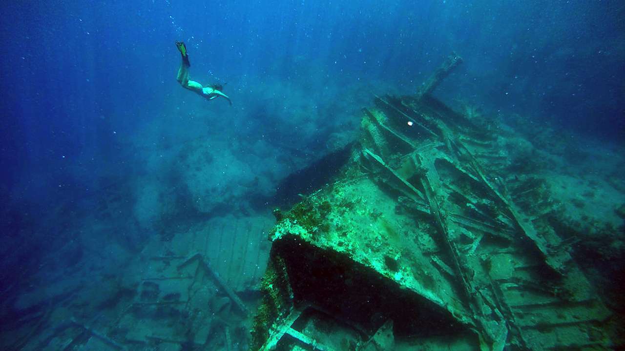 Snorkeling over an aging relic