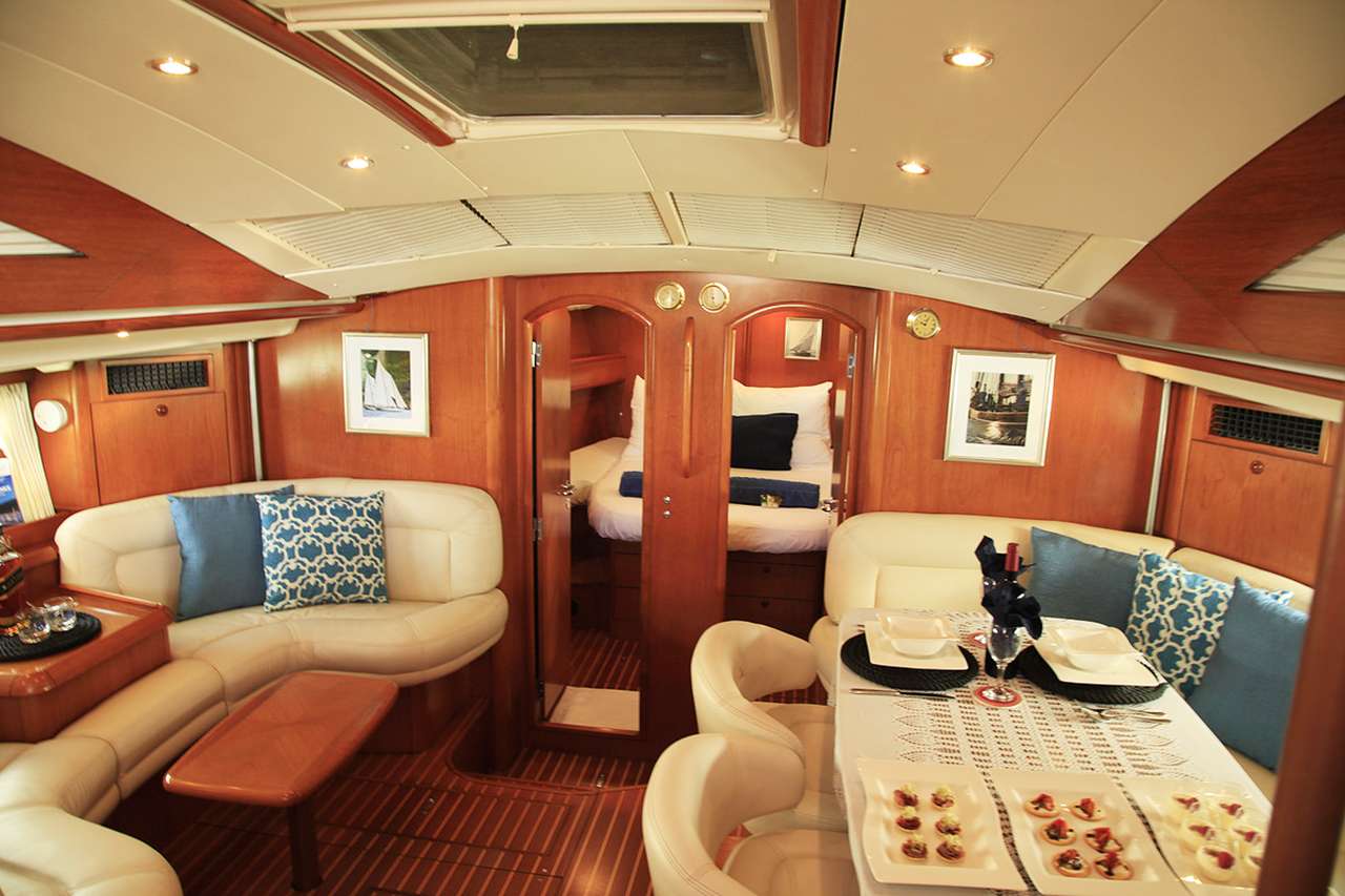 SAYANG Yacht Charter - Saloon lounging area with some snacks!