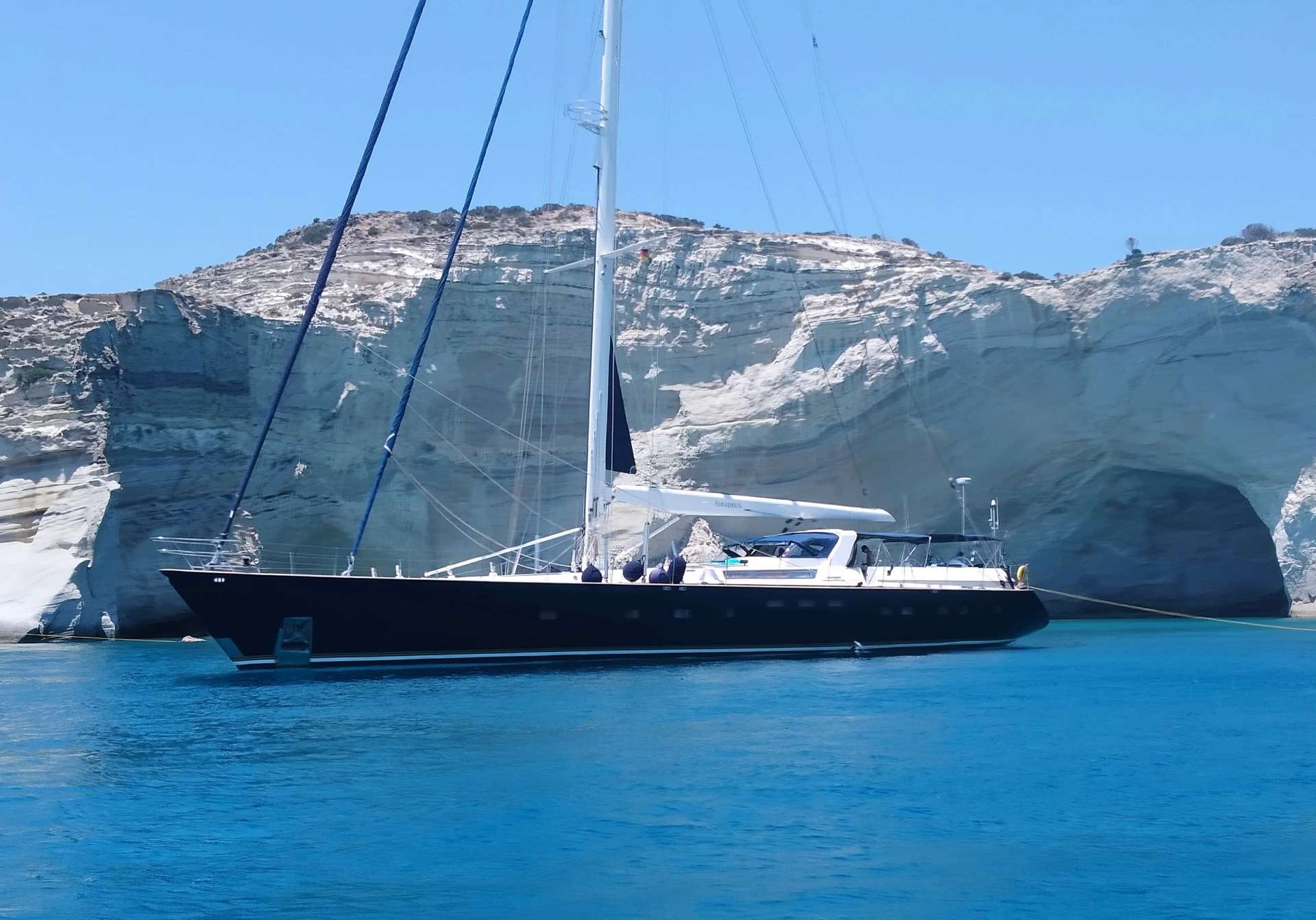 Built by the famous Dynamique Yachts shipyard, and having undergone a total refit in 2018, S/Y Amadeus was designed to please the most demanding of yachtsmen. Built for smooth sailing, this elegant cutter rigged sloop has a sleek hull design, comfortably reaching top speeds of 12 knots and ensuring excellent sailing performance. 

S/Y Amadeus has just undergone this past winter (2018) a major refit such as total repaint top to bottom, new rigging (BSI Denmark), Novourania with new Evinrude 75hp outboard,  Splash pool, new Bimini/Sprayhood/Awnings, new exterior fabrics and many other enhancements.  In 2016 new &ldquo;North Sails&rdquo; were placed onboard. The yacht is maintained in excellent condition with a five-star crew year round.

Her generous uncluttered teak deck offers plenty of space for sunbathing. The spacious and unique outdoor saloon has two tables seating upto 12 guests and is a perfect setting for outdoor dining and entertainment. Thanks to a special canopy and roll-up windows, the deck saloon has the added attraction that it can be fully enclosed, making it ideal for all weather conditions. Her forward area includes a splash pool and sun bathing area which can also be shaded with a removable awning.

From the cockpit, a stairway leads to the light-filled spacious saloon offering ample seating, ideal for relaxing or enjoying a drink from the bar, and offers a formal dining area. This area also includes a LCD TV, entertainment center, ipod dock station, playstation, and is ideal for indoor activities. 

She can accommodate 10-12 guests in one full width master stateroom, two double bedded cabins each having one extra single bed and two twin bedded cabins which can be easily converted to double beds (upon request), thus, making her the only 5 double bedded sailboat in the Greek market.

She also has a nice selection of toys which include water ski (adult and children), tubes, inflatable canoes, wakeboard, fishing rod and snorkeling gear.