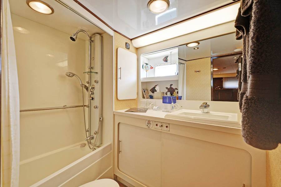 Ensuite Master Bathroom with shower and small bath tub.
