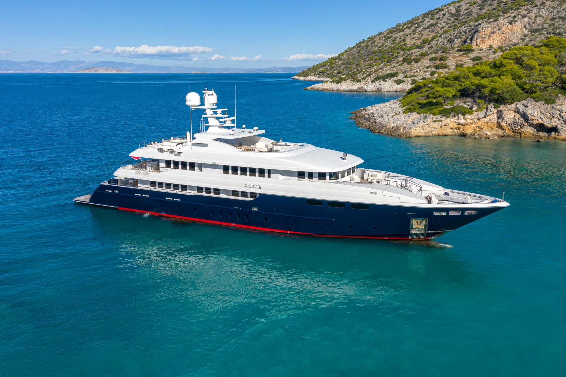 One of the few available 50 metres semi displacement aluminium yachts in the market with variable speed from 12 knots up to 22 knots.The choice of a contemporary, almost minimalist design contrasting with exquisitely tasteful furniture makes ZALIV III unique and original. Materials and colours of the interiors enhance the sense of space. The top deck is fitted with a large Jacuzzi along with TV on fly. She has been built with the most modern equipment (zero speed stabilizers, 3 large generators, special entertainment system and electrical curtains adjusted with the MAIN LUTRON MONITORING SYSTEM, special lighting design, special and extra insulating level, blue hull and many other features.