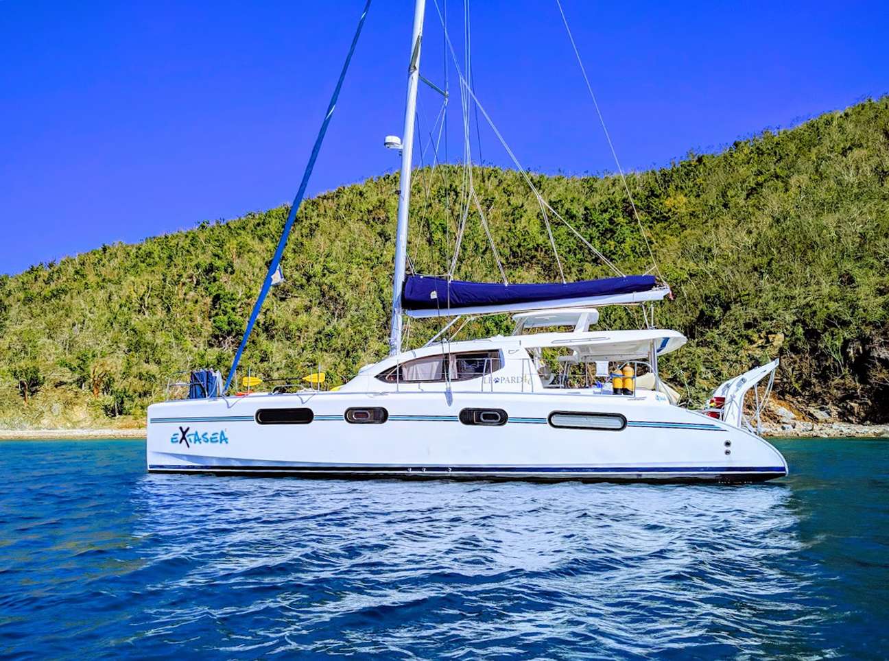 Welcome to EXTASEA 2 BVI Yacht Charters
EXTASEA 2 operates their BVI yacht charters out of Tortola.
Beautiful Boat -  Looking for an exotic getaway in Paradise?  Let Mike and Lesley welcome you to EXTASEA 2, a luxury Owner-Operated Leopard 46 Catamaran, which was voted Cruising Boat of the Year.
Relaxing Atmosphere  - Enjoy your dream vacation in our Feel-at-Home friendly atmosphere, enjoying tropical drinks and fabulous food while you discover idyllic bays, white beaches, and beautiful islands.
Endless Activities -  Snorkel in crystalline waters, SCUBA dive tropical reefs and famous shipwrecks, or partake in the various water-sport thrills, or simply relax and get a tan while your personal chef and skipper spoil and pamper you.
Flexible Itininary  - A BVI itinerary is extremely flexible and the cruising grounds present a myraid of opportunities. Let us show you a good time in the islands. There's an array of exciting things to do within the islands,and a range of fabulous Caribbean beaches to enjoy, each with its own special character and vibe. Together with your skippers advice, we will plan a holiday of a lifetime according to where your wishes and the weather takes you.