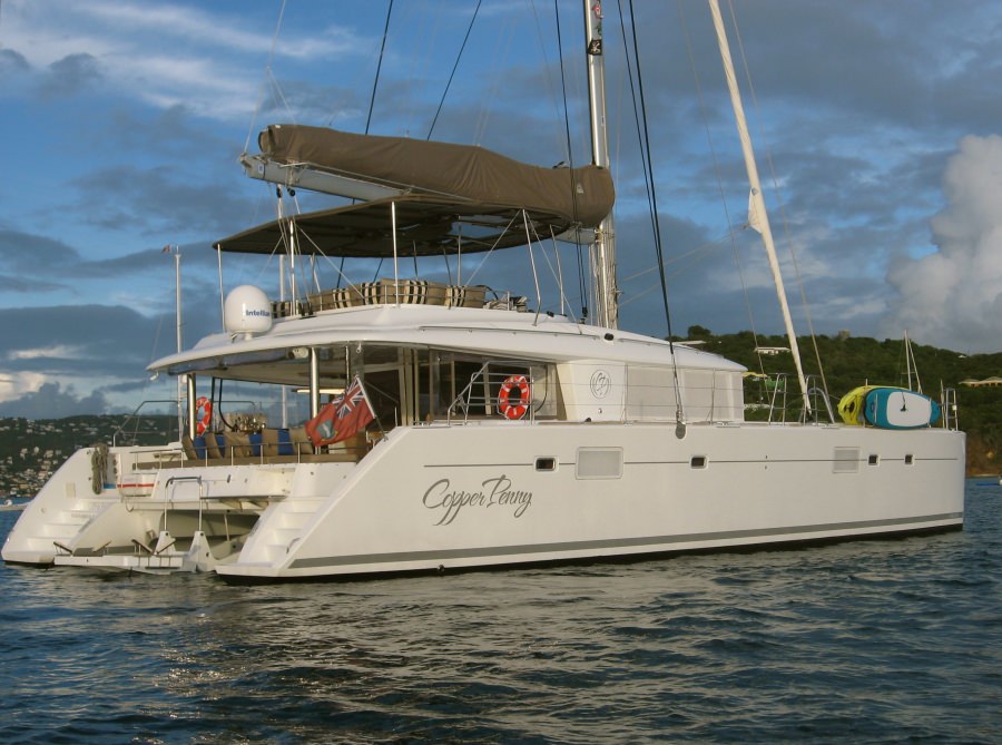 Copper Penny - An Innovative and luxurious offshore cruising catamaran, professionally crewed and available for charter in the pristine waters of the British Virgin Islands. Spacious, and well-equipped with both toys and technology, Copper Penny, a 2011 Lagoon 560, is the perfect vessel for experiencing the beautiful British Virgin Islands.

Copper Penny accommodates up to 6 guests in 3 spacious cabins each with a queen sized bed and en-suite. Enjoy a Blu-Ray DVD on the 18" flatscreen tv in your room or keep in touch and read the news online via the boat's wireless internet. Watch your favorite college football team play on the 42 flatscreen 3-D TV in the salon or spend your time on Copper Penny completely unplugged  its your vacation, your way.

If you like to be active, weve got the gear. Strap on the waterskis, snorkel a reef teeming with tropical fish or throw a line in the water as we sail to Anegada - activities and options abound on Copper Penny. Your captain is also a Padi Divemaster so if youre a certifiied diver, you will definitely want to check out some of the great dives in the BVI like the Wreck of the Rhone or Diamond Reef. Your weight integrated BC and dive computer make it easy.

What more to say? Swimming, snorkeling, hiking, wakeboarding, tubing or just relaxing with a book and one of the captains specialty rum drinks. Copper Penny  what could be better?
