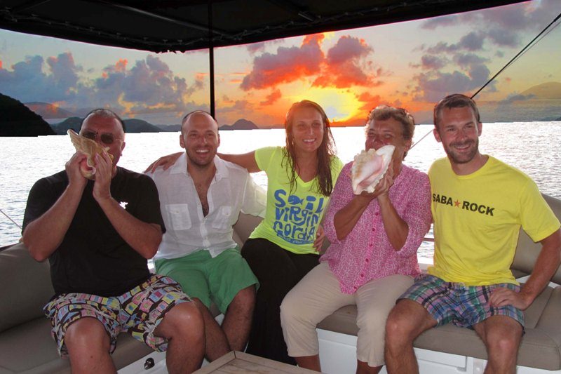 COPPER PENNY Yacht Charter - Blowing the Conch at Sundown