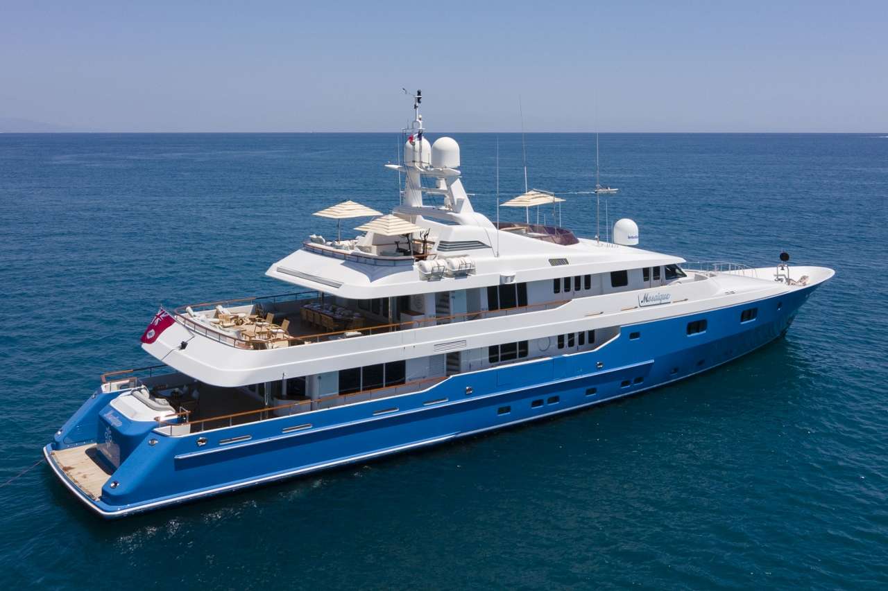 Designed by the world-renowned Dubois Naval Architects, Mosaique is a sophisticated and stylish luxury yacht which, thanks to her thoughtful and creative design she retains a sense of intimacy throughout her spacious decks and luxurious suites.
Featuring all the elements necessary to set the perfect tone for relaxation in the luxurious settings of Mosaique’ s ample main deck saloon, linked by an elegant foyer that leads to the formal dining room for 12. The spaces are gracefully decorated with a palette of modern, classic tones, set off by neutral carpets and soft furnishings, the upper deck saloon offers a charming alternative.
On the main deck the magnificent, full beam master suite sets the standard for the remaining five staterooms, boasting a separate seating area and a stunning bathroom lavishly decorated in onyx and marble. A fully integrated audio-visual system supplies all the cabins with an impressive selection of entertainment options.
The yacht's sundeck is a highlight of the design and incorporates a Jacuzzi pool surrounded by sun pads and loungers, a bar and two tables for informal, alfresco meals, allowing guests to drift through the day enjoying the finest cuisine and service in great privacy. The upper deck offers a great alfresco dining option with seating for up to 16 guests around a beautiful oval teak table with removal leaves to create a more intimate dining experience. This deck also hosts the yachts gym equipment, which consists of a running machine, recumbent bike, training bench and weights. The bimini shade offers protection for maximum comfort.
Mosaique’s stabilisers underway and at anchor make being at sea or anchoring in idyllic, secluded spots comfortable and relaxing and with a choice to zip ashore for lunch or water ski with one of the yacht’s two tenders. The abundance of water toys including jet skis, paddle boards, inflatables and much, much more are guaranteed to make days on board fun filled and exciting from dawn to dusk.
With a host of opportunities for guests to wind down in the ultimate style in some of the world's most stunning cruising grounds, your luxury charter on board Mosaique will not disappoint.
