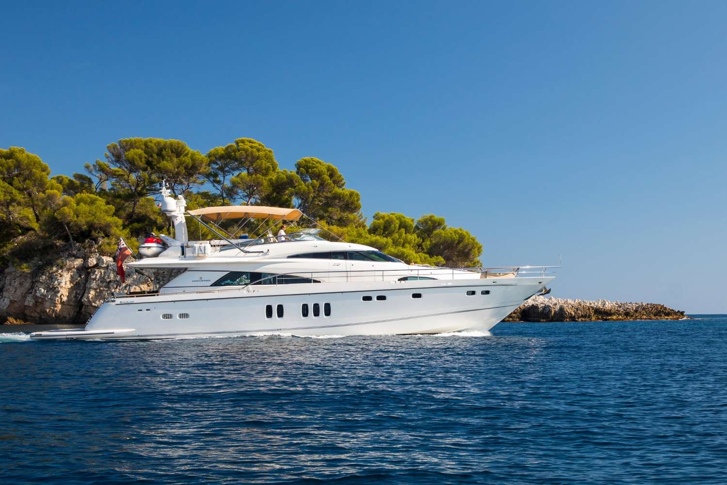 This gorgeous Fairline Squadron 78 provides generous living areas both inside and out. Her chic modern décor with luxury furnishings, beautiful woods and quality leathers provide the perfect setting for stylish cruising of the Mediterranean.
The spacious outdoor areas provide sociable dining experiences on both the aft deck and flybridge, together with lounge and sunbathing areas. On the foredeck there are sunpads available or, alternatively, original ’fatboy’ seat cushions for sun lovers! The Flybridge is also equipped with a bimini cover, serving bar, sink, fridge and separate sound system.
D5 accommodates 8 guests in 4 cabins offering a luxury boutique feel. The Master stateroom is bright and airy thanks to the triple portrait windows with sofa, vanity table, walk in dressing room and large ensuite with double sink and walk in shower. There is a VIP stateroom forward and the two twin guest cabins both have full length berths and a spacious shared bathroom.
D5 offers comfort and style and is ideal for a luxury yacht charter with family, friends or corporate clients.