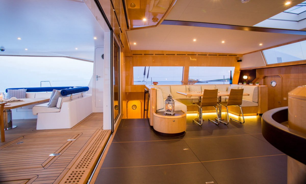 WINDQUEST Yacht Charter - Living Room Opens to Aft Deck