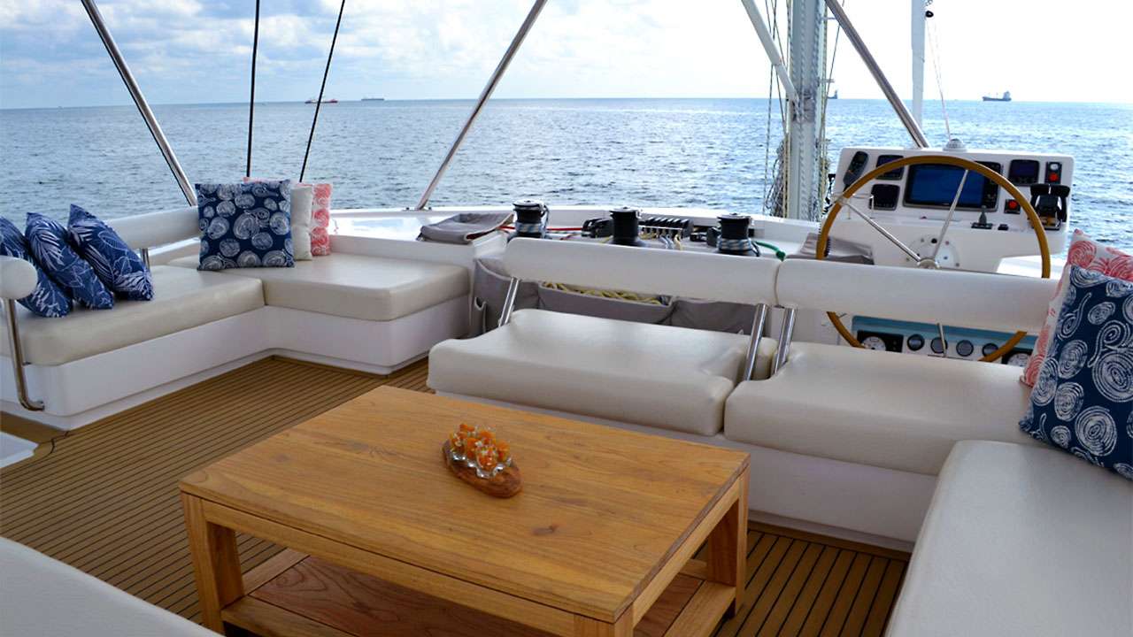 SOMETHING WONDERFUL Yacht Charter - Flybridge seating with new teak table