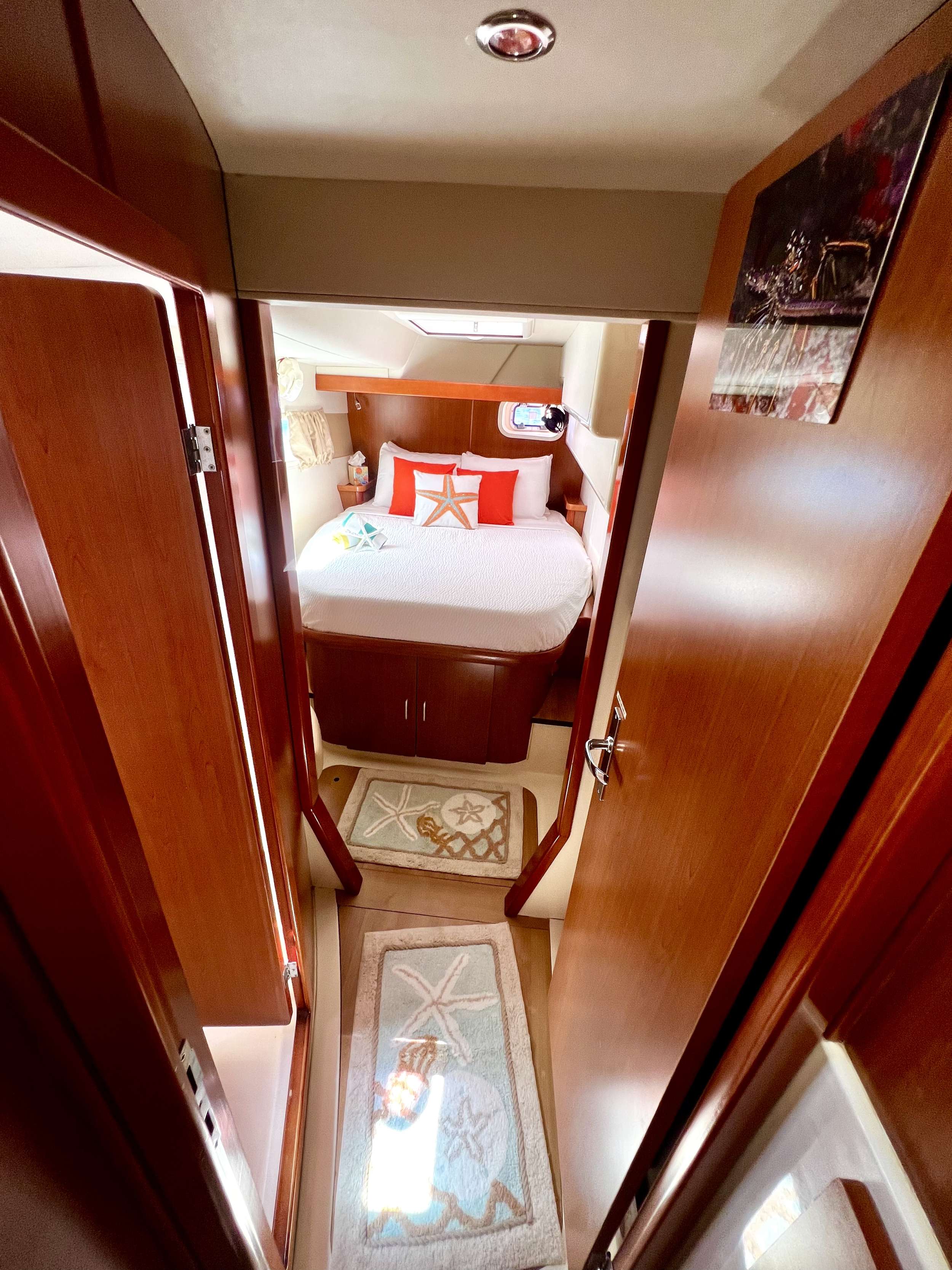 Aft cabins (2 identical cabins for guests located on port and starboard sides of yacht). 