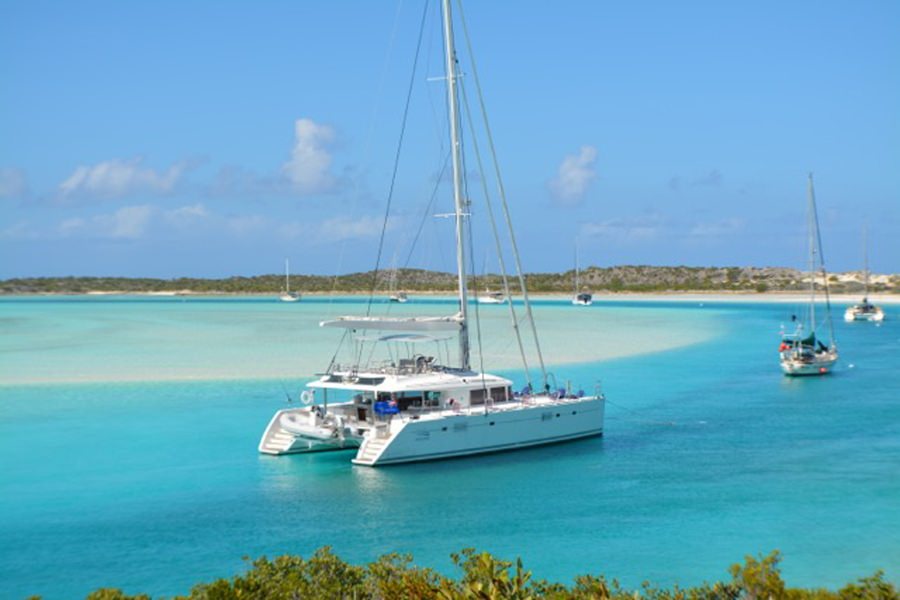 Beautifully designed with comfort and style in mind, luxury sailing catamaran AMURA II is an elegant charter yacht delivering a first class sailing holiday in the Bahamas.   Suited for those that appreciate modern sophistication, this superb 56' Lagoon from CNB Bordeaux offers stylish open and bright living areas, plenty of deck space for lounging in the sun, and exceptional amenities.

Guests enjoying a yachting getaway onboard charter yacht AMURA II are invited to relax and unwind in the most beautiful of surroundings.  Contemporary in their design, the lovely interiors are spacious, elegantly appointed, and impeccably maintained. The salon finished in a soothing color palette has panoramic windows allowing natural light to flood through, lots of comfortable seating options, and stylish furnishings.  Delivering a sweet retreat and a respite for relaxation, guest accommodations onboard sailing catamaran AMURA II are divine.  There are four elegantly-appointed double cabins with space for up to 8 guests, each of which are ensuite and feature a radio, mp3 player, TV and DVD.

Affording guests spectacular views during their holiday, the deck areas offer a variety of options for taking in the sights and with sunny skies and blissful tropical weather year-round in the Bahamas, many moments are sure to be spent outdoors.  Whether savoring an alfresco meal on the aft deck, getting kissed by the salty air on the forward trampolines, or soaking up the sunshine on the flybridge, AMURA II delivers the finest perks of a sailing getaway.  For non-stop fun and exhilarating action on the water, there is a wide assortment of toys including kayaks, water skis, donuts, and snorkel and fishing gear.

Nothing less than exceptional, delivering standout style, supreme comfort, and superb service, a heavenly sailing holiday exploring the islands of the Bahamas awaits onboard luxury catamaran AMURA II.