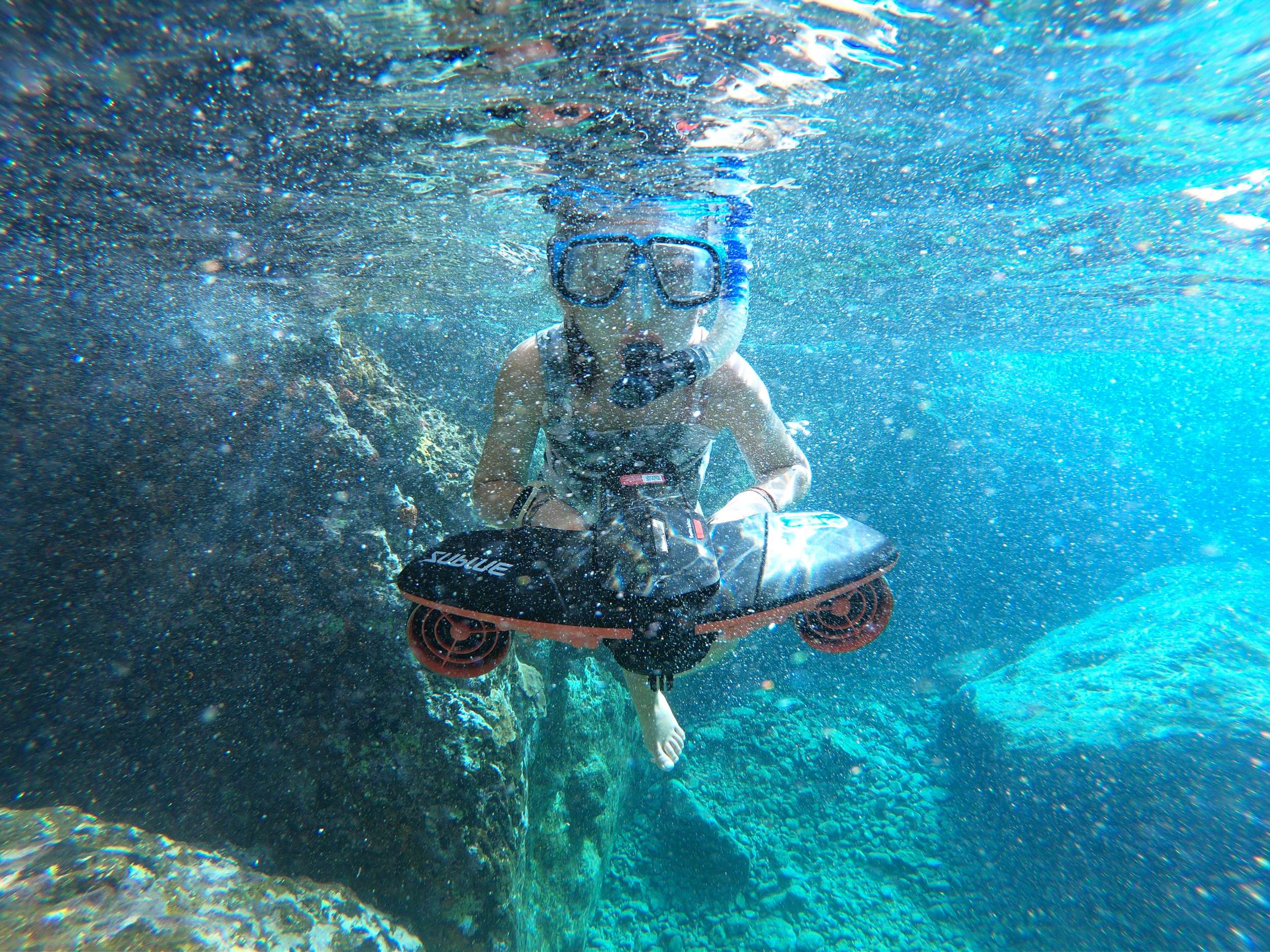 Guest using E water scooter