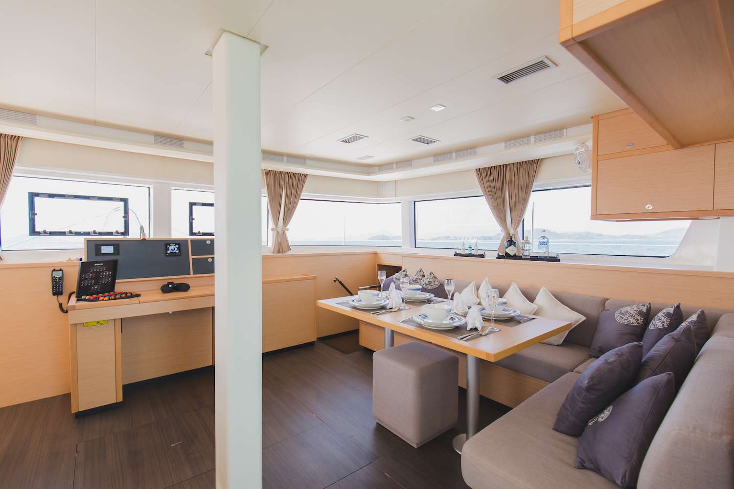 Blue Moon Yacht Charter - Salon - Sofa and Navigation Table