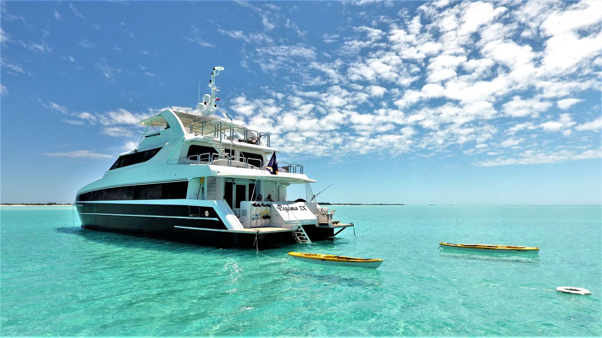                                                                                      IMPORTANT MESSAGE 
DUE TO THE CURRENT UNCERTAIN TIMES, THE OWNER OF PEGASUS HAS AGREED TO OFFER  PENALTY FREE CANCELLATIONS ON ALL CHARTERS BOOKED ONBOARD PEGASUS IX UNTIL THE OFFICIAL END OF THE PANDEMIC OR ANY OTHER PANDEMIC.

This 92ft Jet Drive Power Cat is is made for cruising in the Bahamas. Offering  her guests three decks of luxurious indoor and outdoor living space combined with its ability to deliver them to the far reaches of the Exumas, in comfort, safety and at speed.
With a maximum draft of 4.1ft (1.4m), she can explore the shallows of the Bahamas like no other yacht in her class. capable of exploring and anchoring in depths as little as 5ft. promising an up close and personal experience of the Islands beaches and bays, keeping you in calm waters where you can swim out of the currents.
Her 2 engines deliver 4000Hp of thrust via a modern Jet drive system that accelerates her to an astonishing 33 knots with ease. Ensuring limited time at sea and more time on anchor, enjoying the warm Bahamian waters.
Sleeps 6 guests in 2x kings and 1x queen. All en-suite. 
3 highly experienced permanent crew who have been aboard since 2016.
