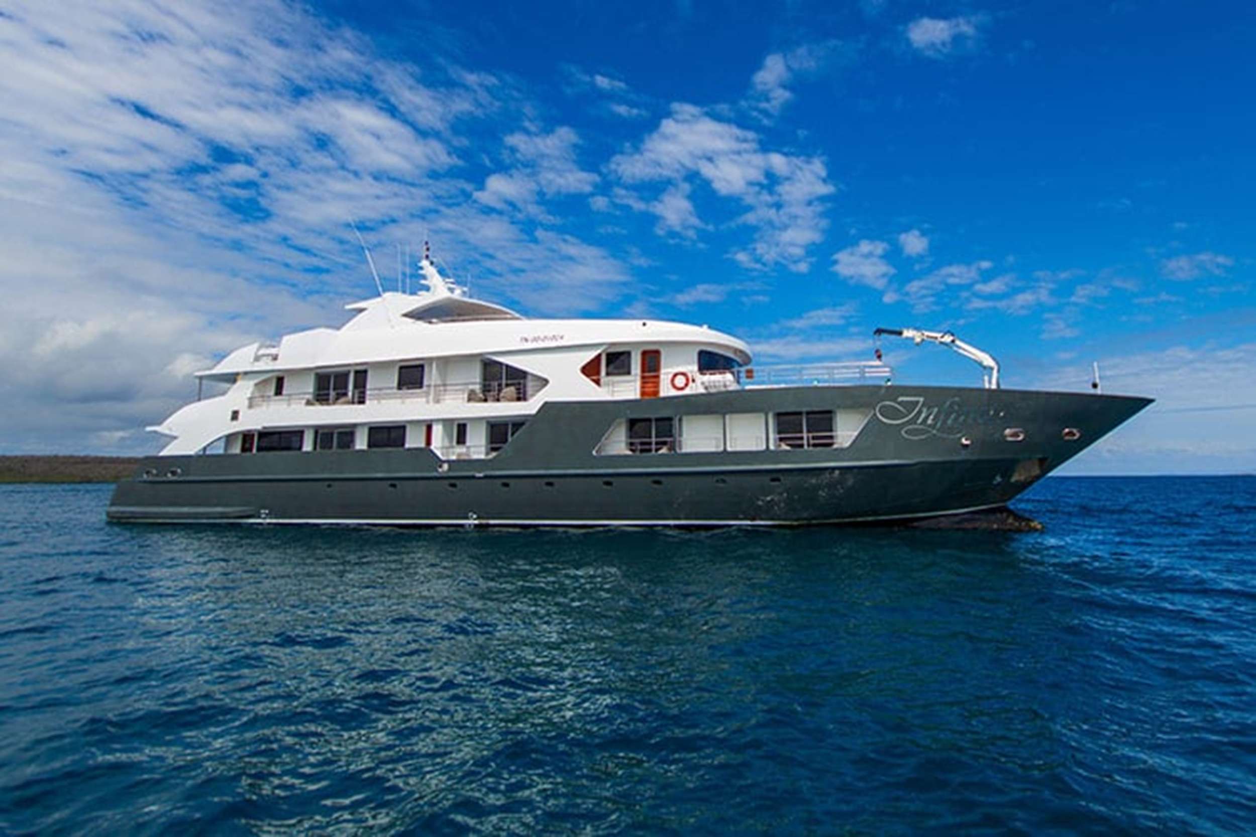 The Infinity is our most modern yacht (2018) with unrivaled spacious luxurious cabins and suites.

Outside dining and bar and also a solarium allow you to cruise the Galapagos in tremendous style and sumptuous luxury. All eight cabins and two suites have private balconies.

Main Deck: 6 double cabins (237ft&sup2; / 22m&sup2;, 226ft&sup2; / 21m&sup2; and 270ft&sup2; / 25m&sup2;), Dining room (1,216ft&sup2; / 113m&sup2;).

Upper Deck: 2 double cabins (247.5ft&sup2; / 23m&sup2;), 2 double Suites (360.6ft&sup2; / 33.5m&sup2; and 376.7ft&sup2; / 35m&sup2;).

All cabins with private balconies, hot water and air-conditioning