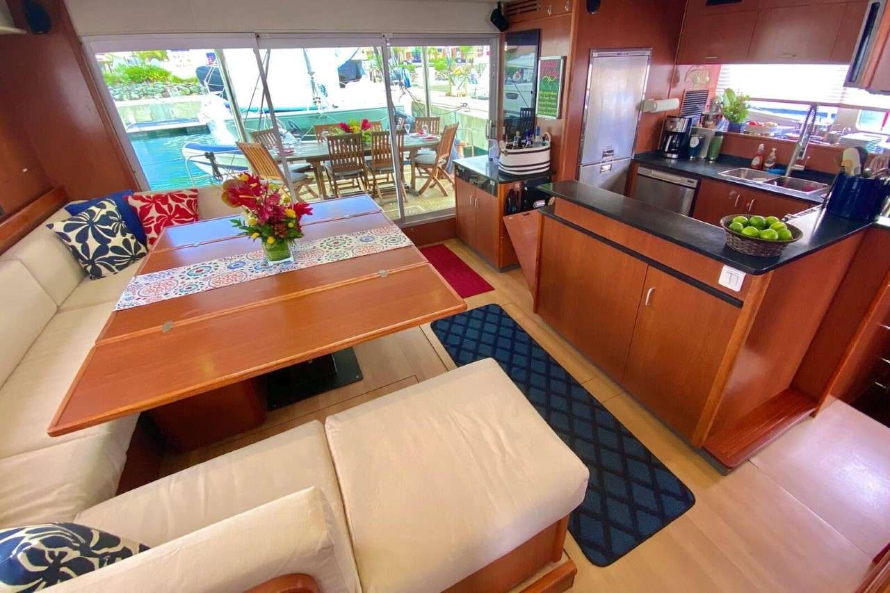 SEA ESTA Yacht Charter - The open aft dining deck is just outside the galley/salon space.