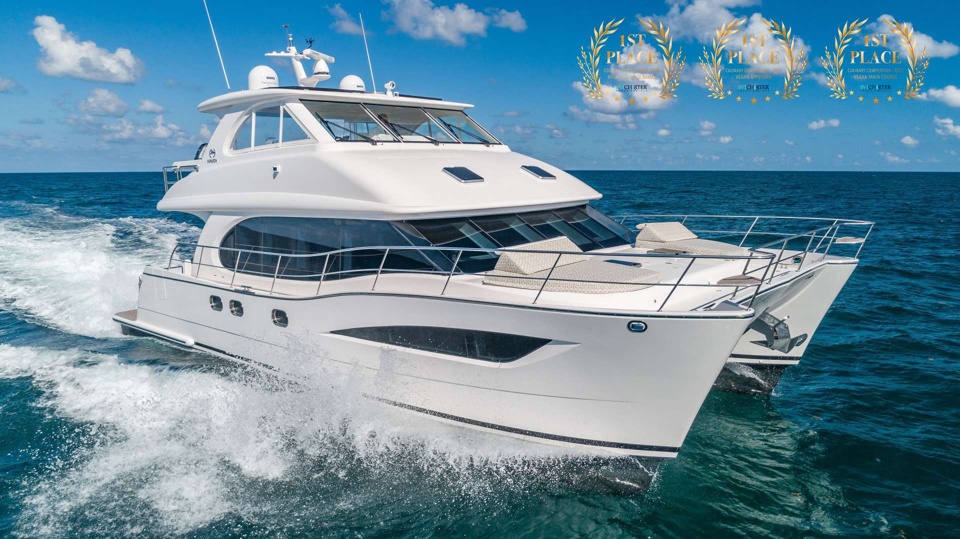 Look to Horizon to produce such a spacious and commodious 52 powercat.  MYSTIC SOUL's design is nothing less than stellar! She is nothing less than a blue water cruiser, but beneath the proven hull design are two bespoke guest queen suites and a spacious saloon and galley.  Couple that with a large flybridge and helm station and ample aft cockpit deck, and you have the recipe for a fine charter yacht.
The perfect choice for a BVI charter for 4 discerning guests: MYSTIC SOUL!
Mystic Soul features an award-winning crew: Captain Phil Ashford and Chef Audrey Bouillane.  Chef Audrey won 1st place in the BVI Charter Yacht show for both her appetizer and entry and Captain Phil won 1st place for his rum cocktail.  Foodies will love spending a week aboard Mystic Soul with Phil and Audrey! 
