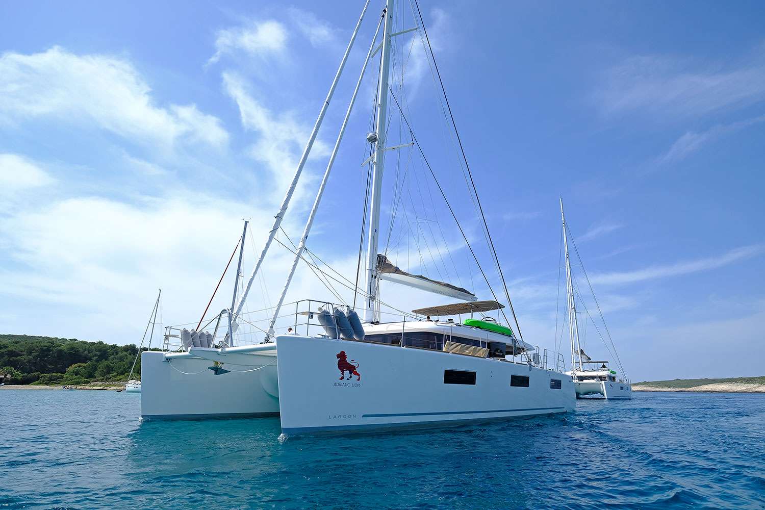 If you want a well built, high performance catamaran, then the Lagoon 620 is one of the best on the market today. Whether you are vacationing with your family, or entertaining guest, this is a catamaran that is hard to beat.

Lagoon 620 Adriatic Lion is ideal for the clients who wants to experience the art of living aboard in an innovative way.

There is just nothing to compare to relaxing aboard this charming &amp; luxurious catamaran. Lagoon 620 Adriatic Lion with five queen size en-suite cabins design is very accommodating. Complete interior layout is elegantly incorporating wood finish, upholstery, inner liners, and more. A functional fly bridge can also accommodate guests thanks to separate crew and reception areas. Saloon and cockpit are beautifully integrated and include &ldquo;wet bar&rdquo;, areas for lazing around and the option on taking delicious meals inside or out without having to make any adjustments.