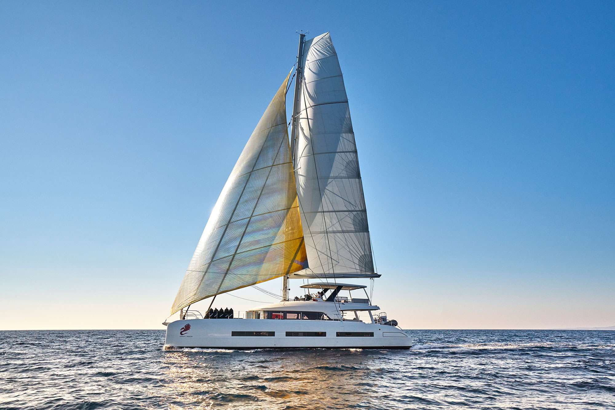 A grand Lagoon seventy7 is not simply a larger Lagoon; it’s another concept, another dimension, a Lagoon belonging to the world of superyachts. A challenge, given the extent to which this universe embodies conventions that had to be incorporated, adopted, without abandoning the generosity and friendliness that are characteristic of Lagoon.
The starting point is life on board. Sailing, living on board, is a succession of moments spent in company with people that you like. We imagined what these moments might be according to the various types of use: family boating, friends, charter... But also how to accommodate the presence of the crew that such a vessel requires.