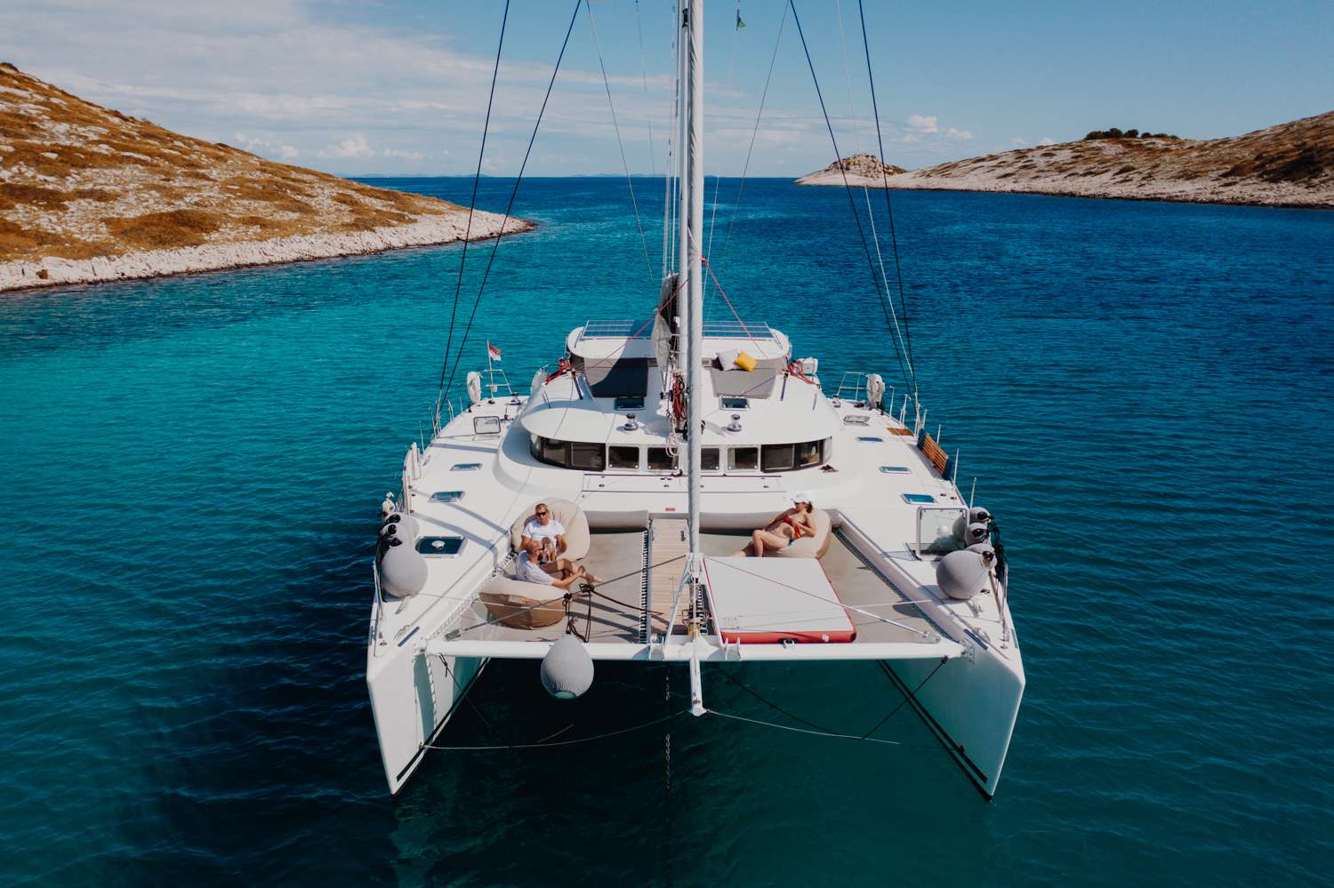 A sailing vacation on catamaran Mala is all about freedom.
Freedom to choose what you want to do, where you want to go, what you want to experience.
You get a unique custom-made vacation on which you can choose from a whole range of places, sites, local dishes and outdoor activities.
Catamaran MALA is a Lagoon 570 based in Split, Croatia. This is one of the most successful crewed catamarans on the Adriatic with an exceptional charter record.
The charter industry is making a conscious effort to reduce its environmental impact. Croatian catamaran MALA is pioneering the future of yachting by installing new lithium iron phosphate (LiFePO4) batteries. These new batteries are a game changer for the industry, offering a more environmentally friendly way to charter as well as improving guest experience. With this system they have reduced the generator hours by a staggering 90%. This means 90% less pollution, less fuel and fumes, less CO and CO2.
Watch Mala's video here: https://www.youtube.com/watch?v=6vB6BLlBcFQ