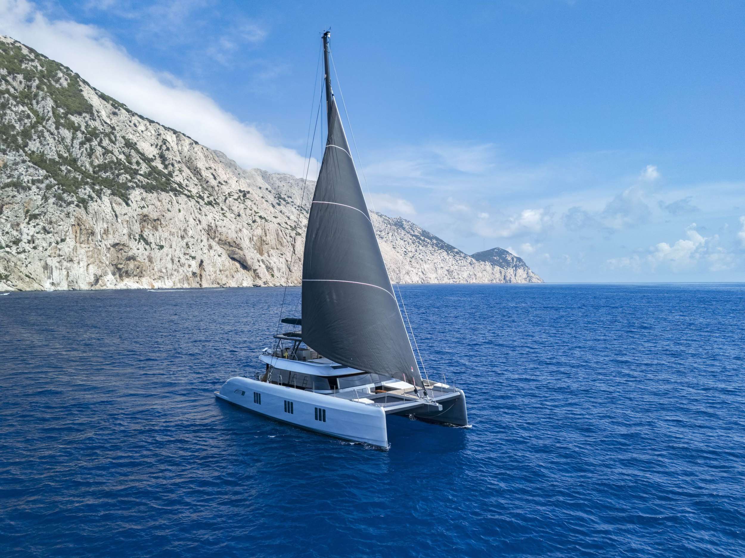 https://esupercat.com/
Discover sailing in silence
Sun’s warmth on your face. Turquoise waters expanding out flat, smooth, gleaming mirror-like. Sails down. No wind. No sound apart from the waves gently lap lap-lapping, as your catamaran glides towards the next dream cove.
Discover a world of sailing in silence.
Discover ‘E’.
‘E’ for exploration, excitement, and electricity…
Embark on your first voyage where you can truly enjoy and immerse yourself in your natural surroundings. ‘E’ offers an exclusive luxury sailing experience that runs entirely on electricity. Responsible boating that is abundant in comfort, elegance and dependable performance. The reality of paradisiacal journeys where nothing will disturb you or your environment. Only pristine waters. Lungfuls of fresh air. Peaceful stillness. And complete utter silence …
‘E’ for ease, elegance and exclusive experience…
Let us welcome you onto the expansive aft-deck, indulge your senses in a champagne sunset, sipped from hand-cut crystal glasses. Let us treat you to our culinary creations, a bespoke menu specially designed for your tastes, complete with French titanium tableware. Tread through the spacious interiors, opulent and sleek in handcrafted and couture detailing: Burmese teak flooring, Carrara marbles, flush surfaces - all complimented by a stylish and soothing palate of dark blue and metallic grey tones. After a full day of heavenly explorings, indulge in a Lalique-fragrant bath and sink into our Missoni fabrics for a refreshing night in one of ‘E”s four en suite guest cabins… No compromises. No details left untouched. This is the place to spoil yourself.
‘E’ for entrepreneurial, environmental, and exhilarating…
Reset your expectations with one of the world's most unique high-powered electric propulsion system luxury catamarans – an evolution in nautical engineering. ‘E’ promises sustainable performance sailing, in safety, efficiency, and ultimate comfort. This is the magic and excitement of state-of-the-art sailing: the freedom of the sea, the enjoyment of clean air and peaceful nature, the security of dependable power for unique experiences without ever leaving a trace - all of the time. This world is yours to discover, now.
www.esupercat.com
https://player.vimeo.com/video/369186119
https://vrcloud.com/?pv=1570643101
