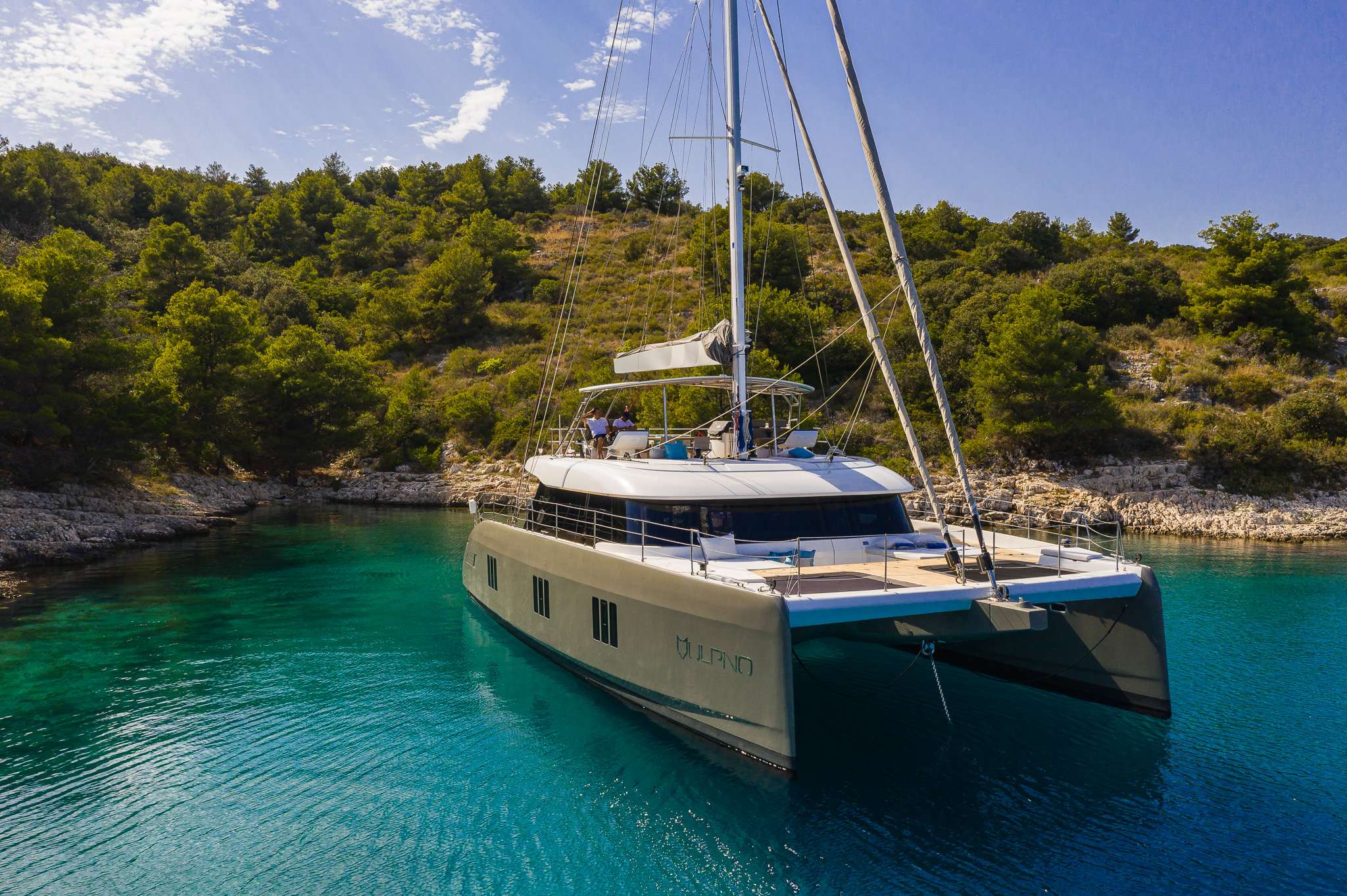 A 2020 launch, the brand new luxury sailing catamaran Sunreef 60 VULPINO has just joined the Croatia charter fleet. This stunning yacht not only features a smart and charter-friendly layout but boasts some impressive social areas at the bow, stern cockpit and flybridge. Whether you are vacationing with your family or want to reunite with your friends this spacious and powerful catamaran is hard to beat. 

Sunreef 60  VULPINO  comfortably accommodates 8 guests in the opulent master suite with a walk-in closet and 3 spacious elegant guest cabins all ensuite, with separate cabins for crew. In each cabin, there is A/C unit with individual controls, plugs, adaptors, 4 pillows, quilt and complimentary bottled water. At every bathroom, guests will find bath towels, hand towels, cosmetic tissues, hair dryer, complimentary L&rsquo;occitane toiletry. The cockpit is stocked with beach towels and complimentary sunscreen lotion. The VULPINO is available in Croatia from May 2020 from Split, and as the optional pick-up/pick off port Dubrovnik.

The crew of three (captain, chef &amp; stewardess), all trained professional with experience in their fields, will make You feel like you are on your own yacht and make sure you have the privacy but still be catered to.

