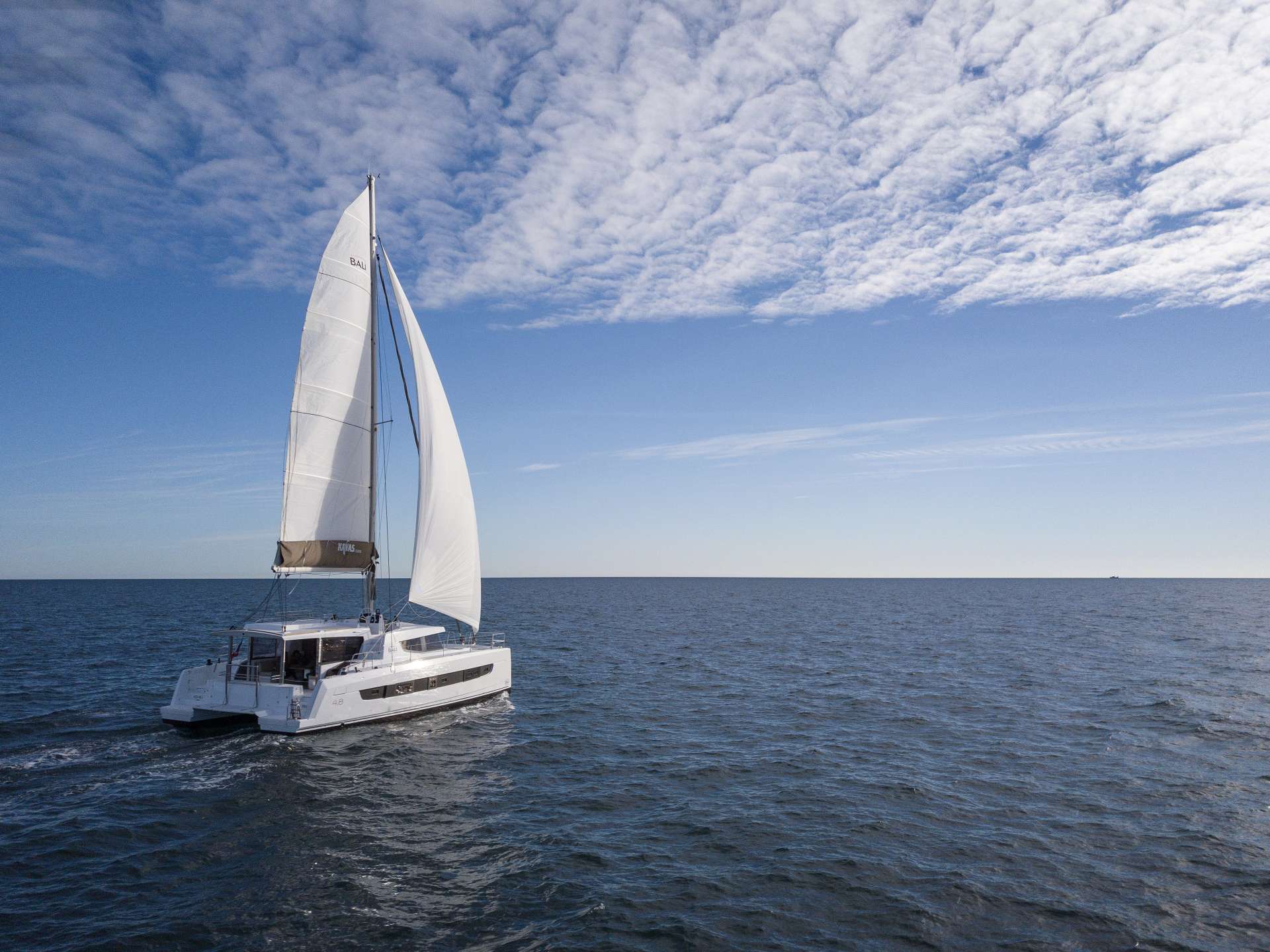NEW 2020!!!!

Enjoy sailing with this new catamaran for 8 guests + crew. 

Bali 4.8
The BALI 4.8 THE ESSENCE OF INNOVATION
The BALI 4.8 Open Space brings together the best of the original characteristics that make up the DNA of BALI catamarans.

In addition to the recognized innovations such as the rigid forward cockpit with lounge area and sunbathing area; the new platform linking the two sugarscoops with large bench seat and lockers; the large tilt and-turn door and sliding windows; and a panoramic relaxation area on the coachroof, the BALI 4.8 offers, as does the 5.4, new access to the forward cockpit by an interior door and cabins by panels opening onto the aft cockpit, and a 6 cabin / 6 bathroom version unheard of on a 48 footer.