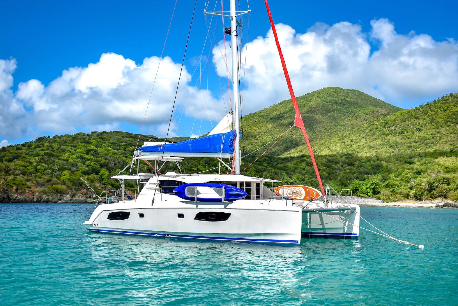 This lovely 2015 44' Leopard Catamaran is built with 3 queen cabins each with private ensuite baths including electric heads, vanity and separate showers. She boasts multiple areas to sit and relax or sip a cocktail and enjoy the cool island breeze of the beautiful Caribbean, especially in its unique forward cockpit lounge that gains access to the trampolines. You can even explore the beneath the surface while staying dry with its onboard clear-bottom kayak! The salon will seat up to 6 guests in comfort for lounging or dining. The exterior aft offers alfresco dining for up to 6 guests and a hammock! Your guests will never forget your experience on LPT!

TOYS: 2 Stand Up Paddle Boards, Snorkeling Gear, Floats, 1 Clear Bottom 2-Person Kayak, 1 Knee Board, 1 Wake Board, 1 Subwing, 2 Fishing Rods &amp; Onshore Games.

DIVING: Offered via rendezvous only