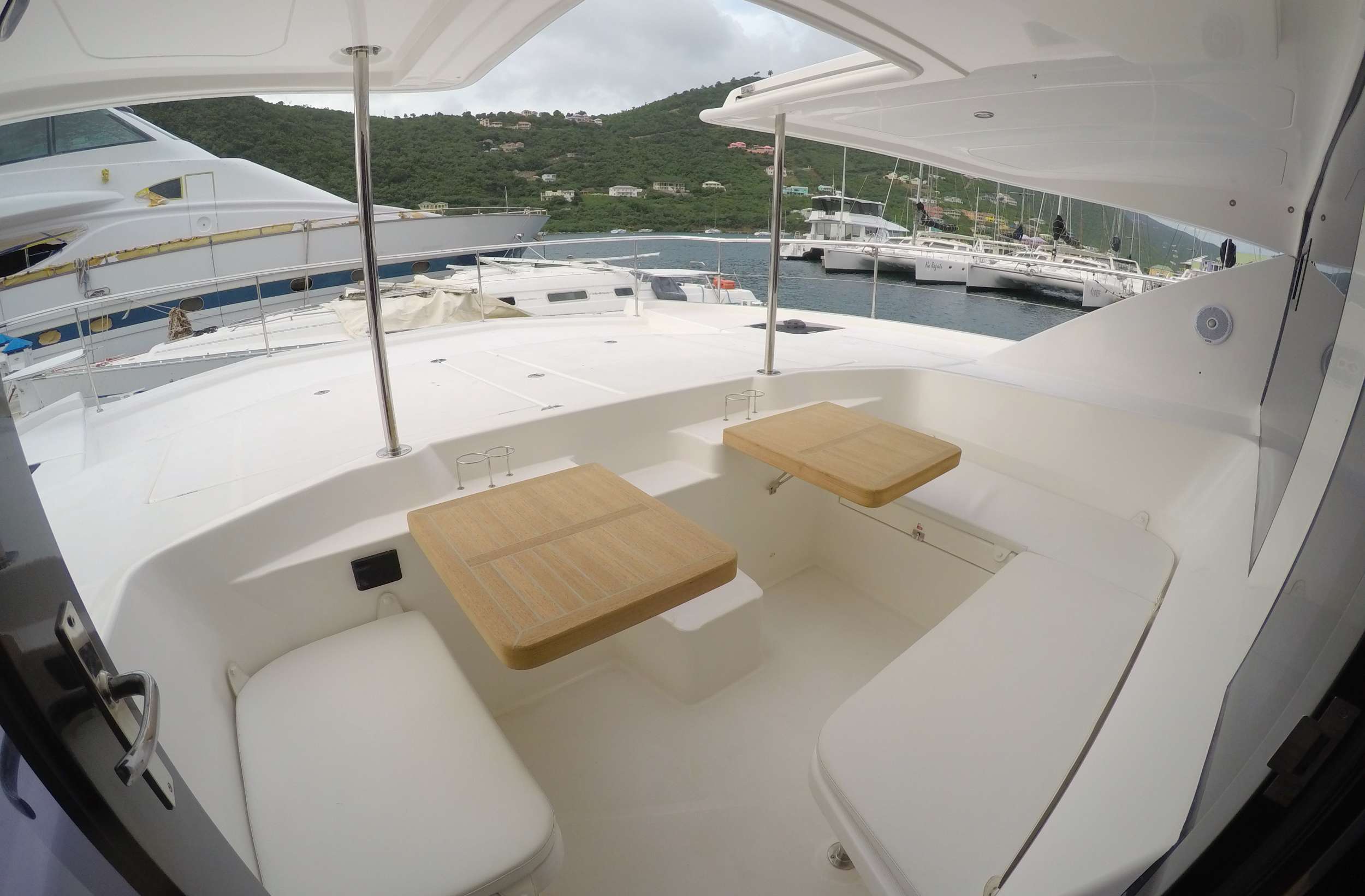 SOMEWHERE HOT Yacht Charter - New teak tables in the forward cockpit