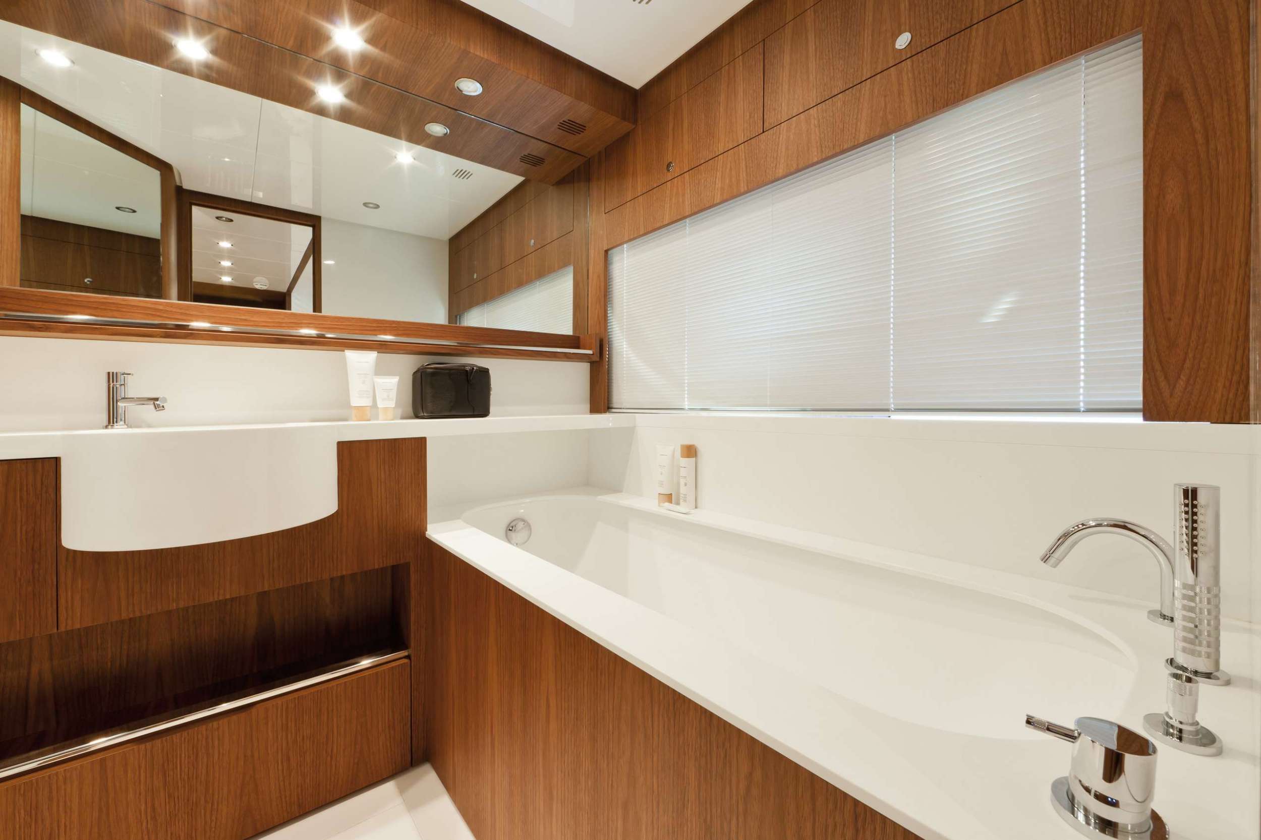 Privilegio Yacht Charter - Double sink bathroom with shower walk through.