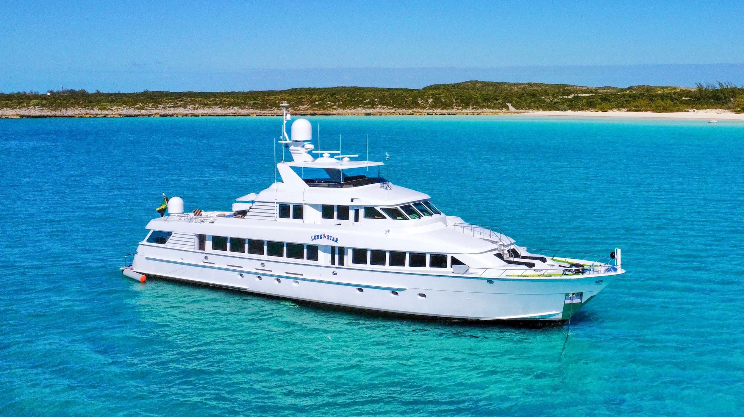 Built by Hatteras as one of only 2 130' super-yacht models, Lone Star is a great choice for family or friends. The open main salon gives 40' of spacious entertaining, complete with marble bar and custom seating. With the additional bridge deck lounge and exterior deck spaces, to include aft dining and seating, an extensive bridge deck behind of the upper lounge featuring walk-around decks leading to bow steps and sun pads, and a fly bridge sun deck with Jacuzzi, guests can find great places to gather or use as their own intimate hideaway!  

Cabins consist of a large full width on deck primary cabin with king berth, and three ensuite queen cabins plus one ensuite twin cabin below. The lower cabins have a lovely foyer that provides a refrigerator, ice maker, and snack station.

Lone Star received numerous recent upgrades to include new custom flooring, new appliances and fixtures, many safety and control systems, plus new entertainment systems. She was lovingly cared for by a very experienced Yachtsman and his crew for the past seven years before being sold to her present owner. During this time, no expense was spared, most every system has been rebuilt or replaced making her better than ever!&nbsp;