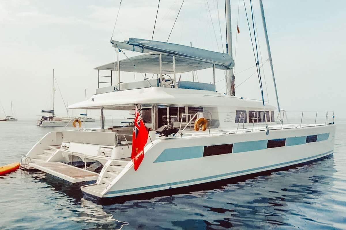 Custom features include an extra-large lowered stern platform and full-size double canvas bimini with integrated lighting