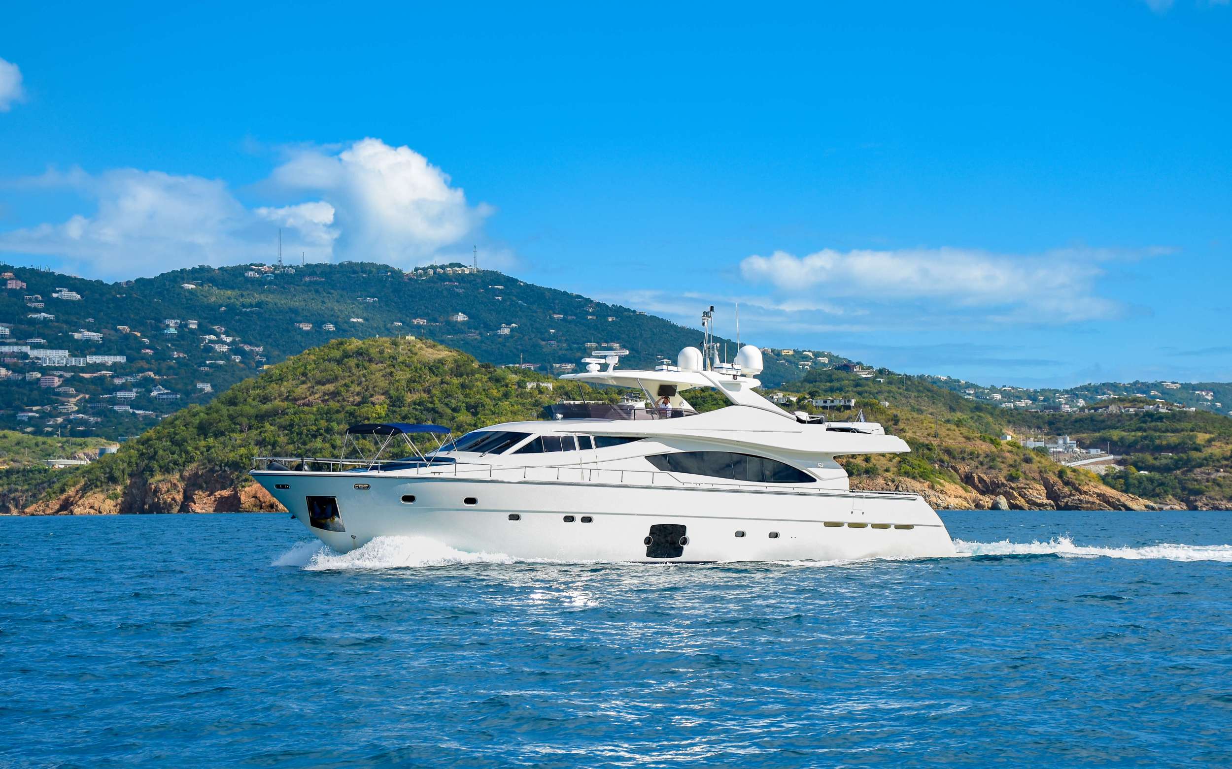 Built in 2006 and a 2022 refit, Indulge II is the ideal luxury yacht for kicking back and relaxing whilst on charter, showcasing clever use of space with an artful combination of integrated systems and luxurious features, she's a crowd-pleaser for sure. She offers guest accommodation for up to 10 guests with a layout comprising a master suite, one VIP cabin and two twin cabins. When chartering with 10 guests, 2 of the guests must be children under the age of 12. She is also capable of carrying up to 4 crew onboard to ensure a relaxed luxury yacht charter experience. Set against the backdrop of your chosen cruising ground, you and your guests can enjoy fun on the water with the collection of water toys and accessories aboard Indulge II. Guests can feel the wind in their hair and jump the waves on one of the two Sea Doo WaveRunners and a plethora of water toys. If that isn't enough, Indulge II also features a top deck hot tub. A large bow-pad with bimini top will protect yourself while enjoying your front row seating while island hopping. When it's time to travel from land to see, it couldn't be easier with a 20ft Zormenti 170hp Tender. It can easily pull skiers, wakeboards and more, plus it seats 10 for optimal guest comfort. Once onshore, she has 2 electric bikes that can be used by guests. Indulge II is a unique motor yacht and the ideal platform for an adventure charter that will guarantee unforgettable memories.
TOYS: 2 Sea Doo Waverunners, Snorkeling Gear, 3 Paddle Boards, 2 electric bikes, 1 Wake Board, 1 Knee Board, Inflatable Water Toys, Adult Water Skis, 6’x18’ Floating Mat, & Beach Games. eFoil is an optional add on - Inquire for details.