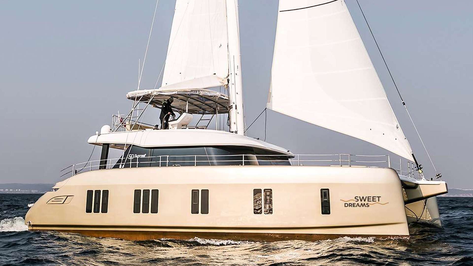 The Sunreef 50 SWEET DREAMS offers a luxurious retreat, comfortably accommodating up to 8 guests in one owner and 3 double, elegantly designed en-suite cabins. Sailing aboard this catamaran promotes a healthy, nature-inspired lifestyle, allowing you and your loved ones to unwind and reconnect with the sea. With two dedicated crew members on board, guests can enjoy a seamless vacation experience, combining comfort, luxury, and personalized service for an unforgettable getaway.
