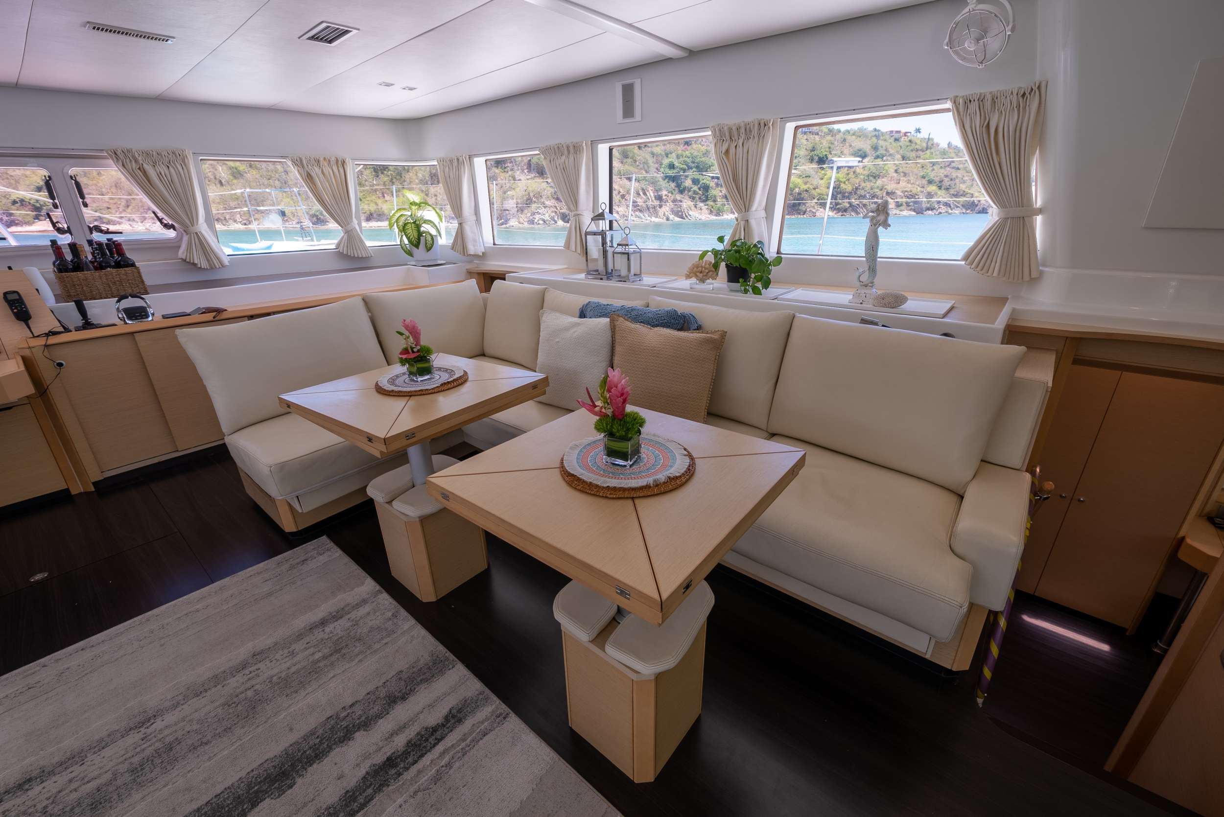 Sip Sip Yacht Charter - Saloon.  Coffee tables convert to dining table