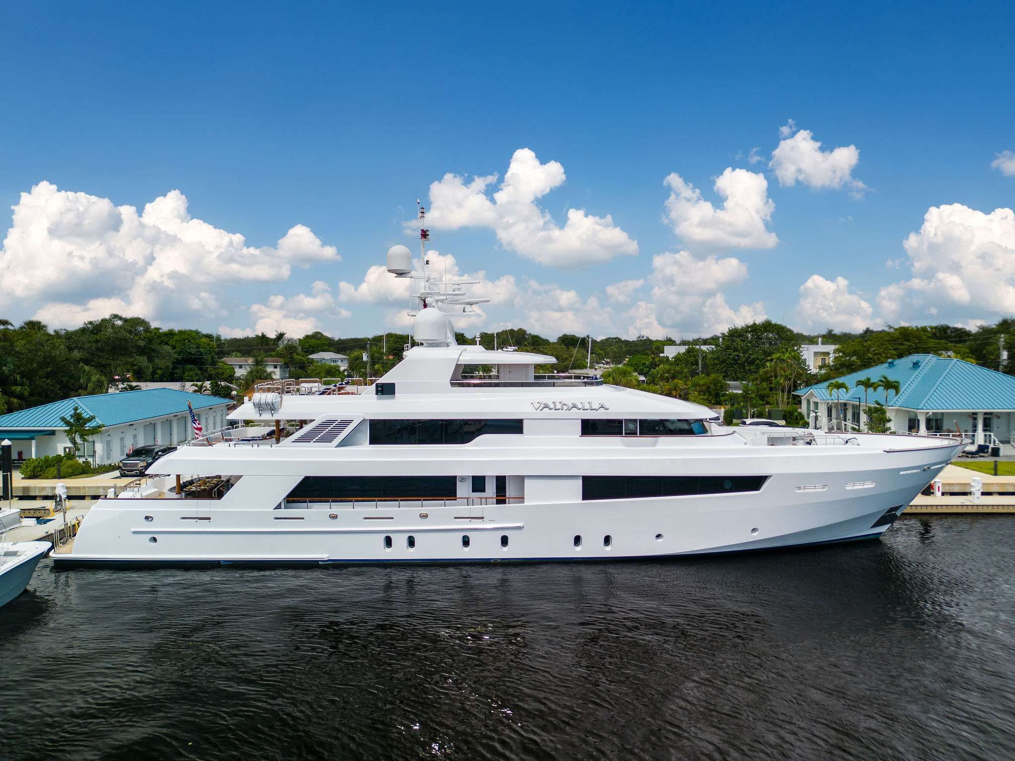 In Norse mythology, VALHALLA is renowned as a place of honor, glory, happiness, or heaven. And indeed, Motor yacht VALHALLA will inspire the same feelings of peace and contentment as soon as you step onboard. Fully refit in 2022 she is fresh and ready to wow. Featuring 6 generous staterooms, an impressive 32' beam, wide companionways, enormous interior volume, and an elevator linking all 4 decks, there is room for everyone to relax and enjoy. On the main deck you will find the full beam owner’s suite with king size bed and en-suite bathroom. The bathroom features beautiful marble and onyx finishes with dual sinks, a spacious walk-in shower, Jacuzzi bathtub and enclosed WC. Below, you'll find two VIP King suites and two Queen suites, while a sixth VIP stateroom with a queen bed is located on the bridge deck.
In addition to the comfortable main salon and formal dining salon you will find even more room to relax up in the sumptuous Sky lounge. A full bar is perfect for those pre-dinner cocktails and stunning ocean views. Aft on the bridge deck is more al-fresco dining as well as space to sit or sunbathe.
VALHALLA's expansive Sun deck is reached either by the stairs leading from the bridge deck aft or via the elevator from any deck below. With plenty of room for dancing or sunbathing. She offers a generous Jacuzzi tub tucked forward of the mast as well as a horseshoe shaped bar with 5 bar stalls, BBQ for the chef to cook up some lunch and there is also a day head on this level.
Her professional crew are ready to show you an unforgettable time onboard, from the mouthwatering cuisine to the fun selection of toys including a Slide, Sea Bobs and a 42’ Boston Whaler Outrage, it’s time to reach your own VALHALLA.